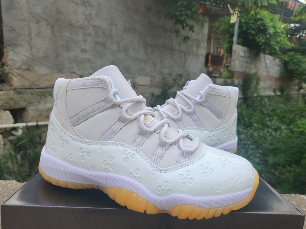 Air Jordan 11 Retro Low 'Yellow Snakeskin'